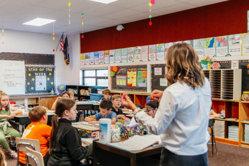 Teacher instructing class