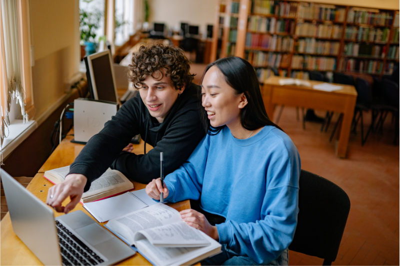 Students working on computer together