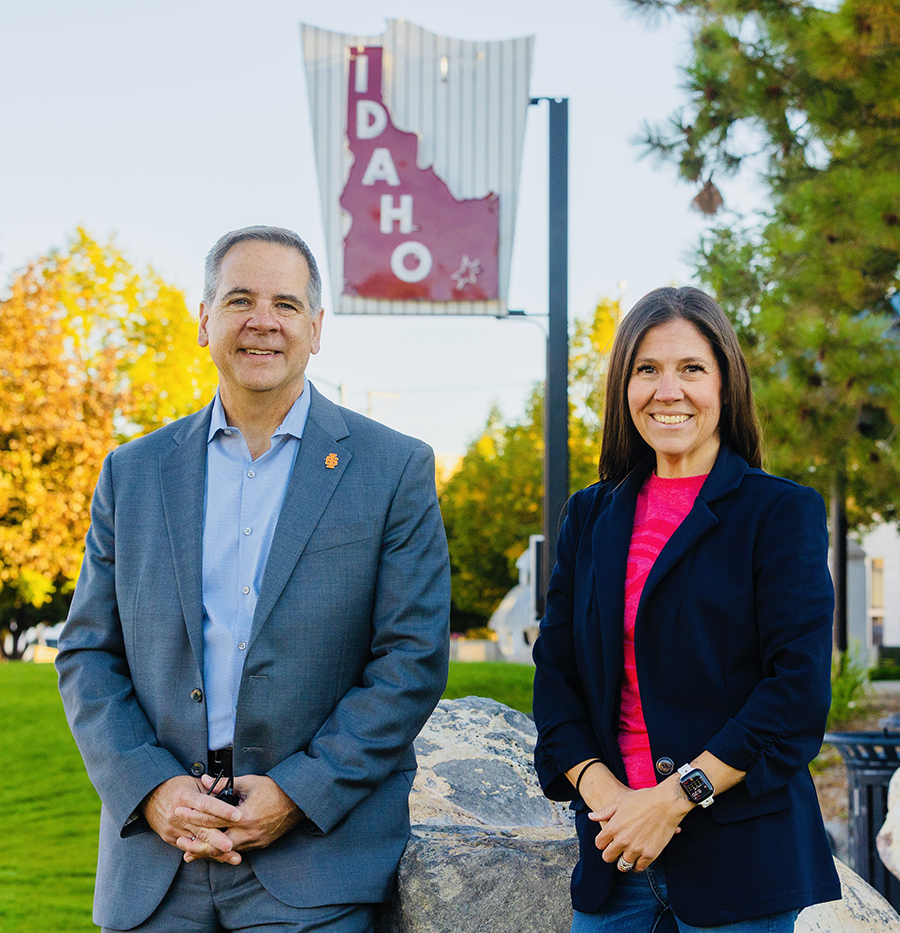President Robert Wagner and Shantay Bloxham at Lookout Point with Idaho sign in the background