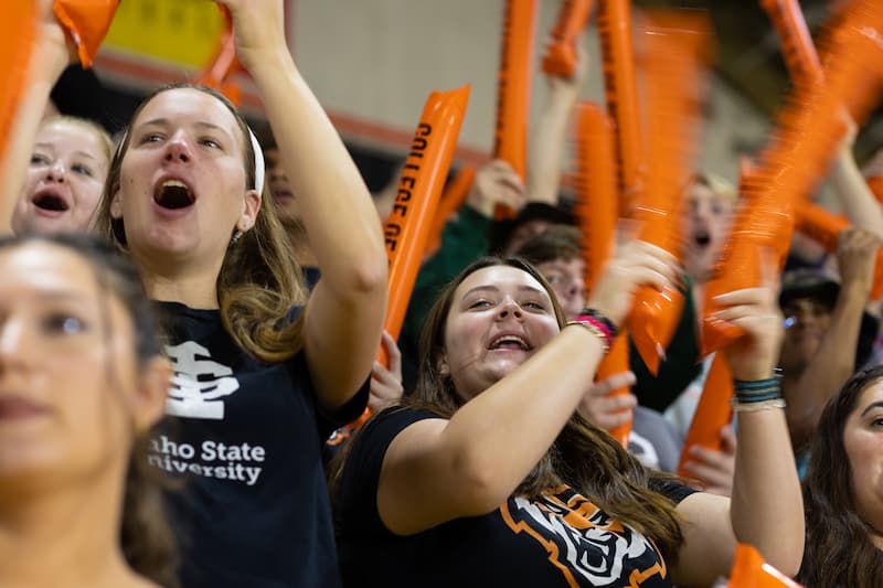 Students at a game cheering for the bengals
