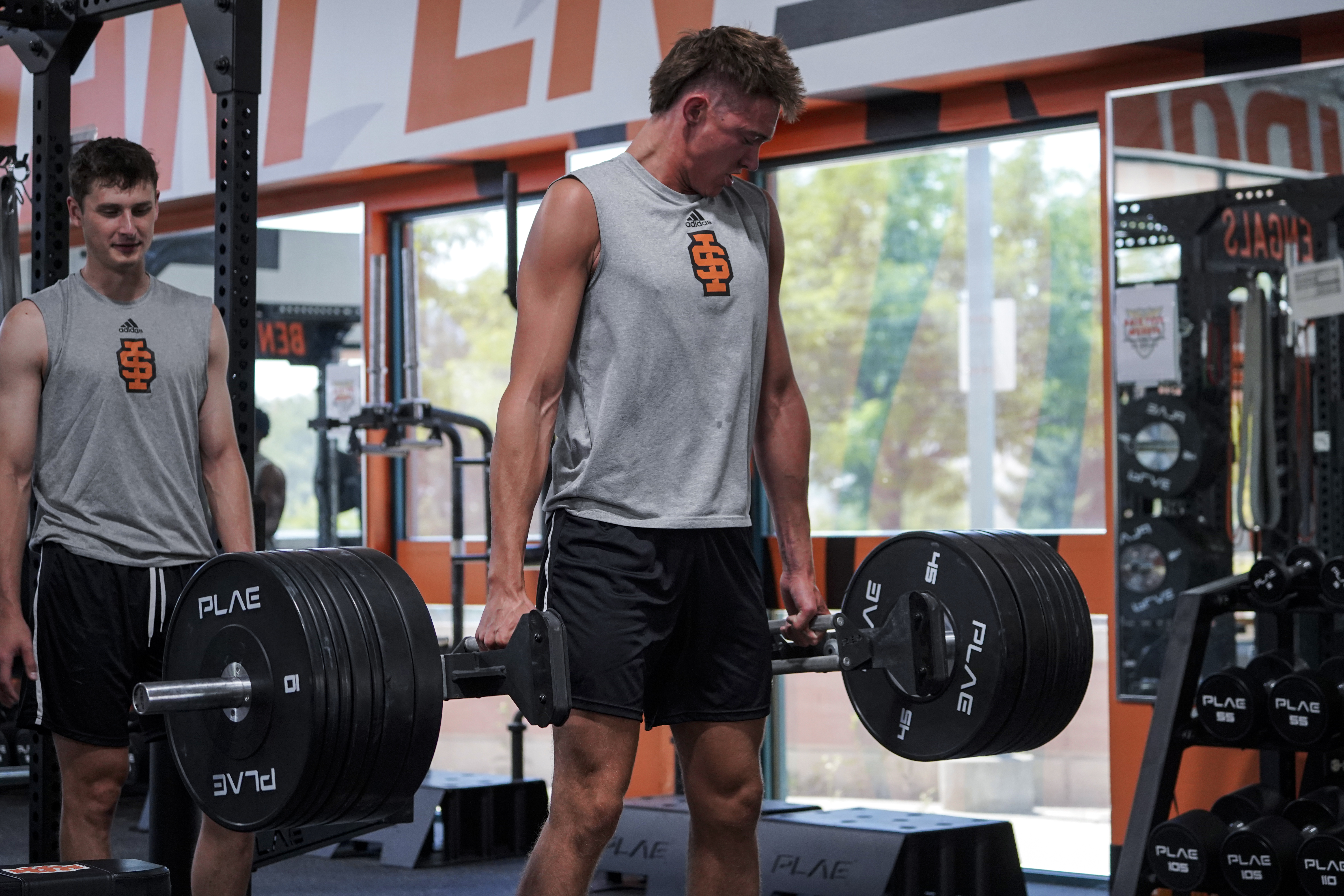 Male Student lifting weights