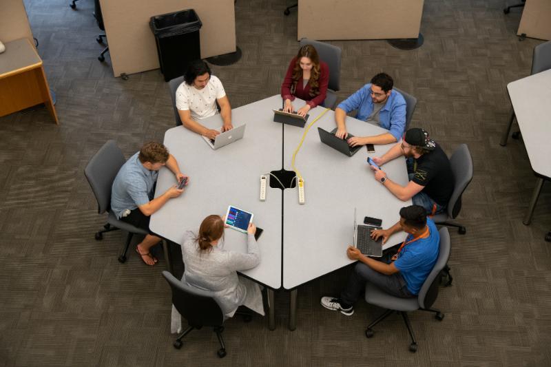 Students sitting around a table