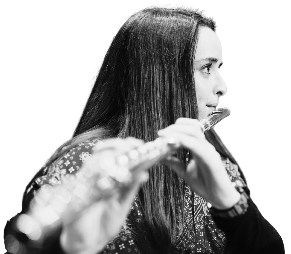 student playing a flute
