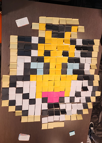 A tiger face made out of sticky notes