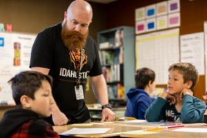 Idaho State University College of Education graduate school student, Mick Morgan, teaches to elementary students.