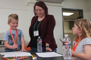 Idaho State University College of Education master's student helps elementary students study science, technology, engineering, and mathematics careers during a summer camp.