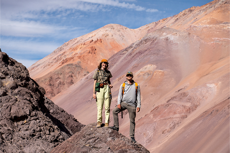 Tiana Hursh and Parker Hazelbush pose after collecting a sample for geochronologic analysis.