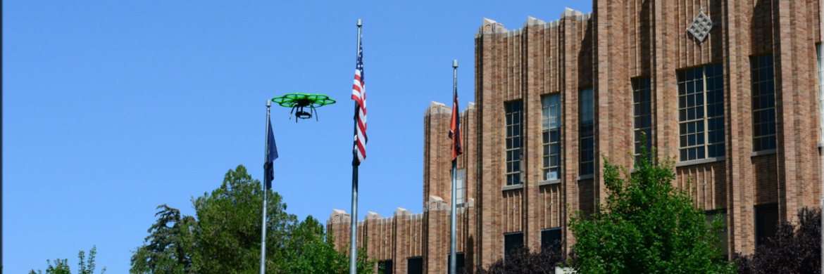 Drone flying in front of the ISU administration building