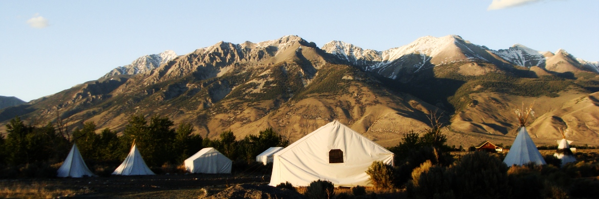 tents in front of mountains at field camp