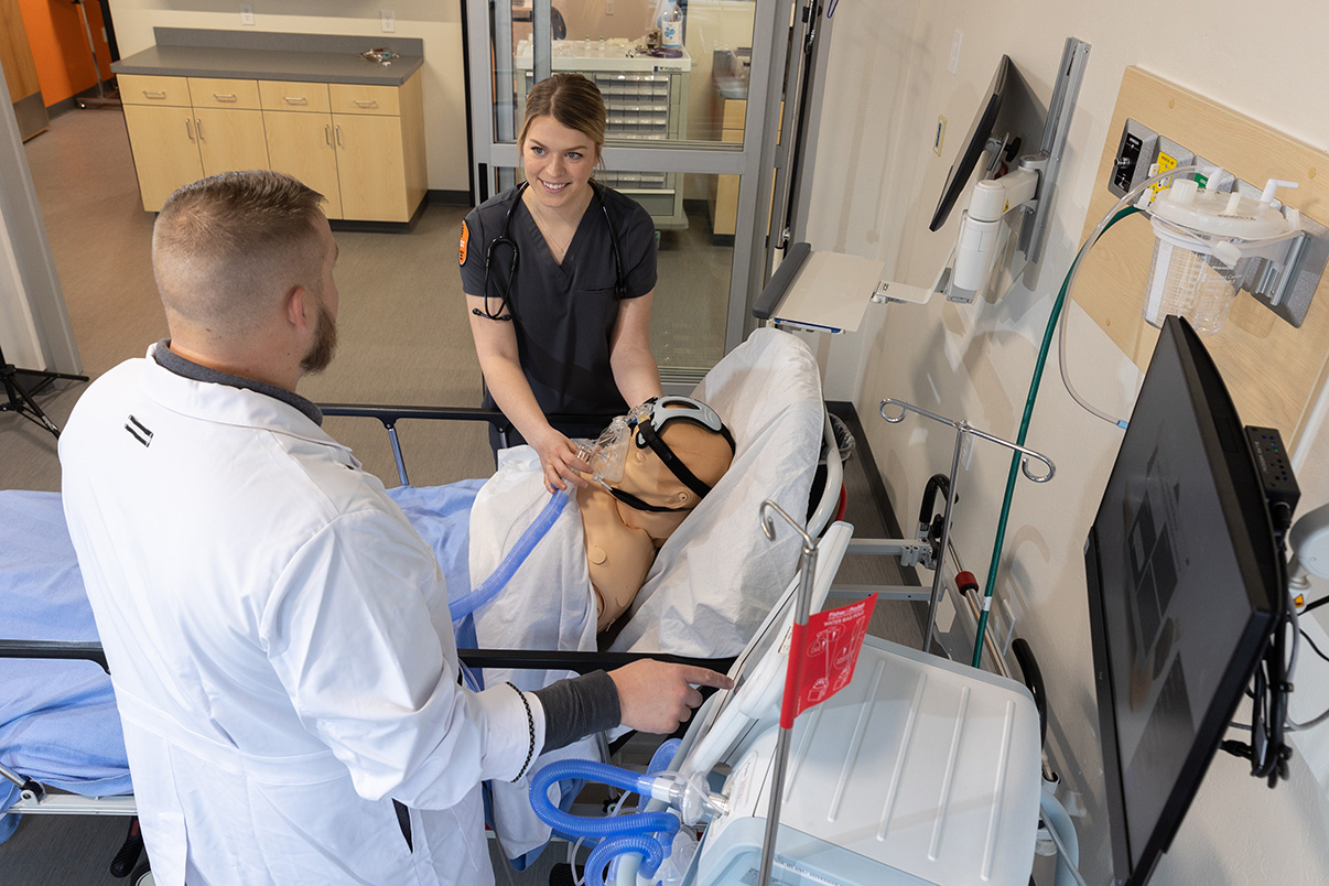 Respiratory Therapy Instructor and student in simulation lab