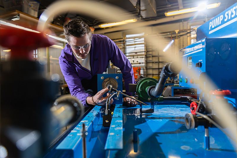 Mechanical Engineering Technology student working in lab