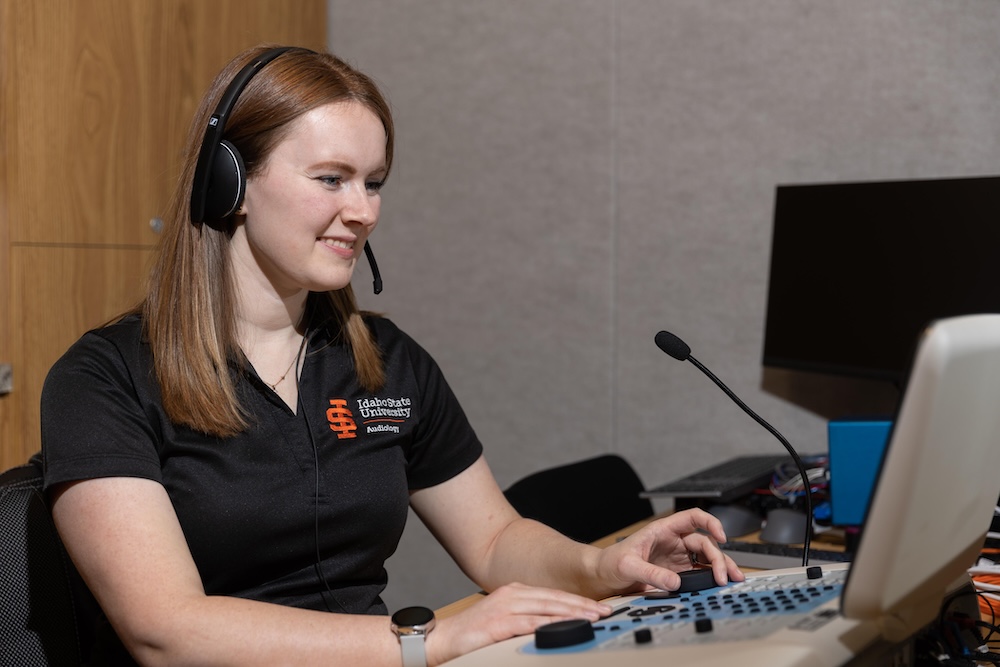 Student using an audiometer