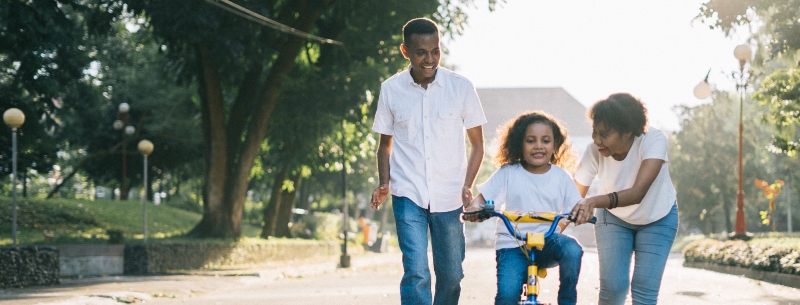 A family walking at a park