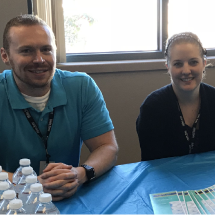 Community nutrition students educate seniors at community health fair about the importance of staying hydrated