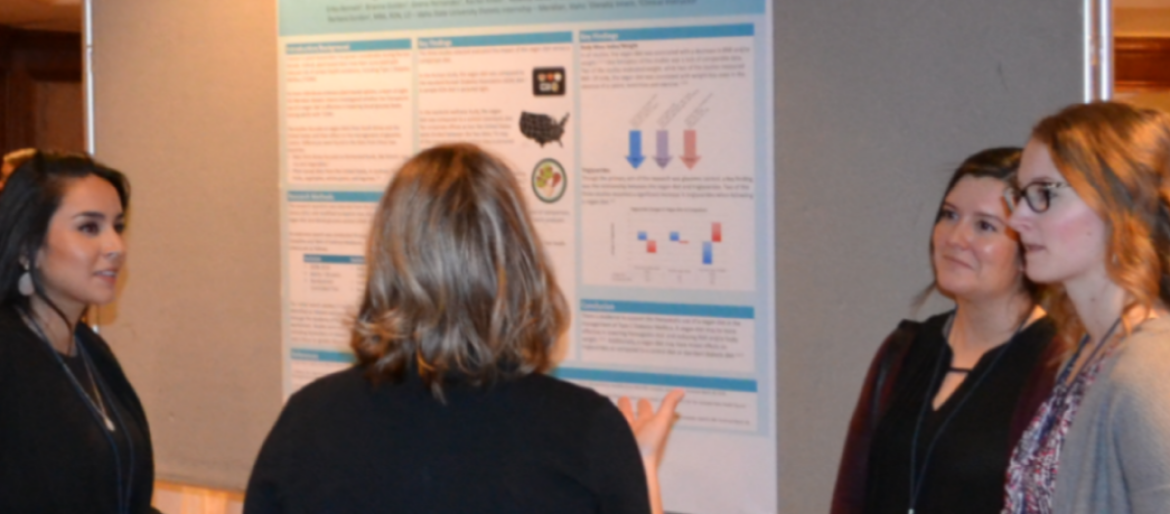 Dietetic interns present their research findings during poster session at state dietetics meeting
