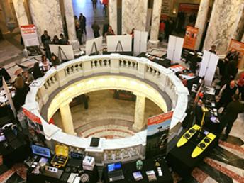 Idaho capitol building rotunda with ISU information booths during ISU Day at the Capitol 2018