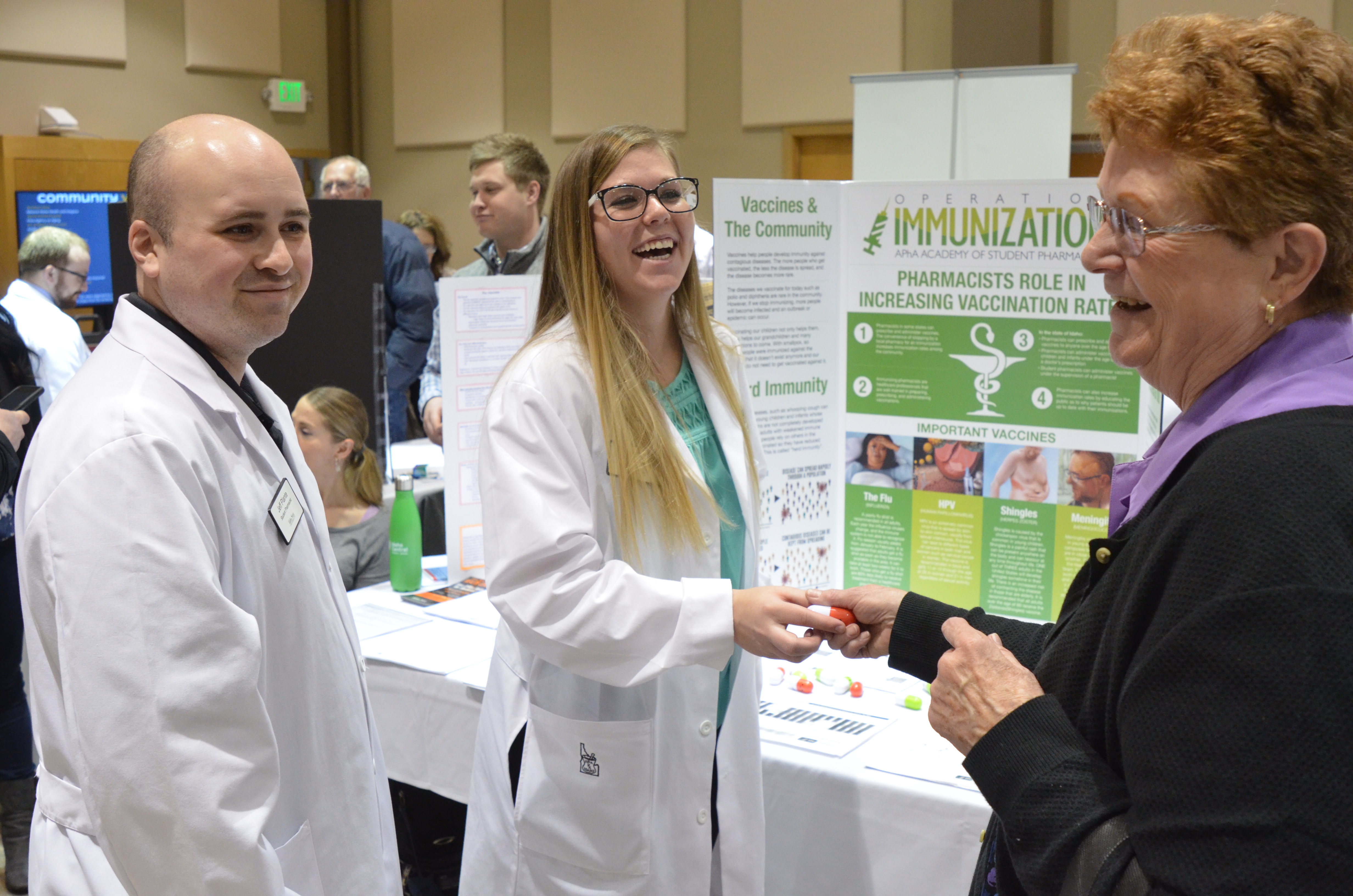 Pharmacy Students with Visitor at 2018 Health Fair