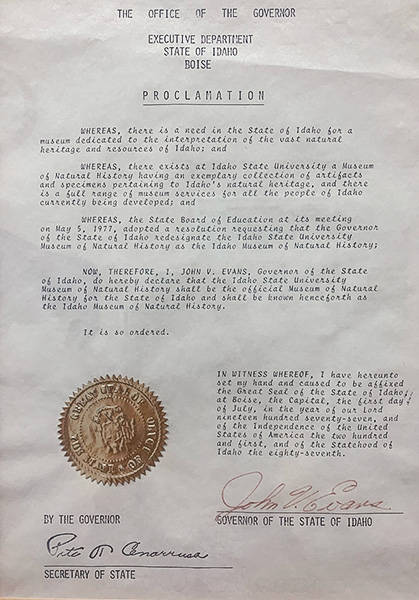 Document designating the Natural History Museum as Idaho's Museum of Natural History, signed by Governor Evans.