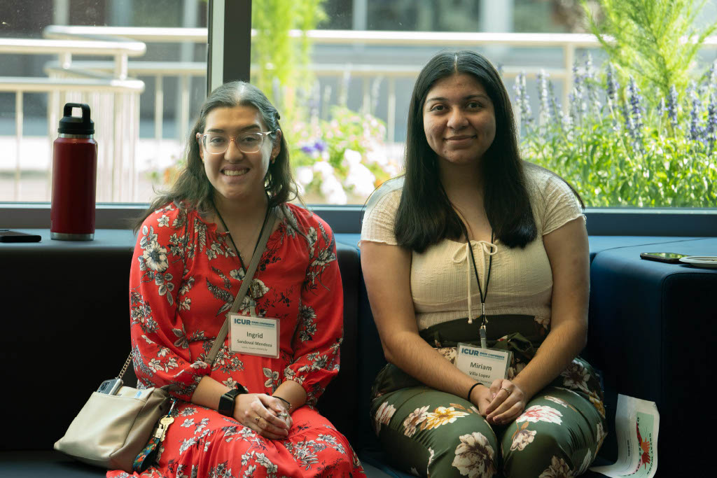 Picture of 2 undergraduate researchers attending the 2024 ICUR session in Boise