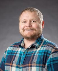 A headshot of Russell Moss