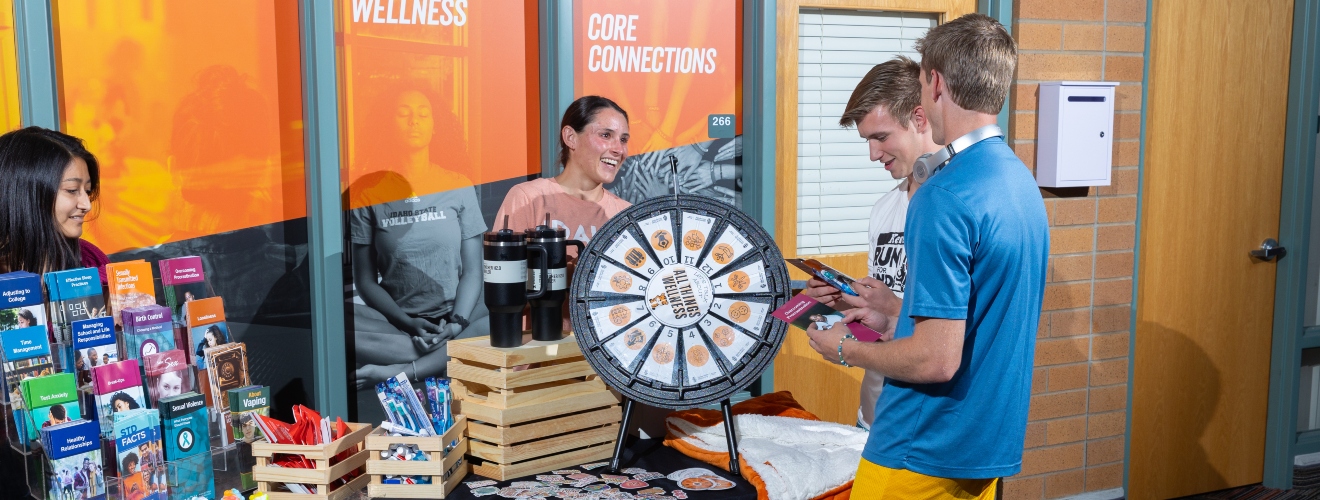 Students at a wellness tabling event.