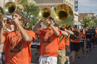 A picture of some of the Marching Band's horn section at the 2016 parade.