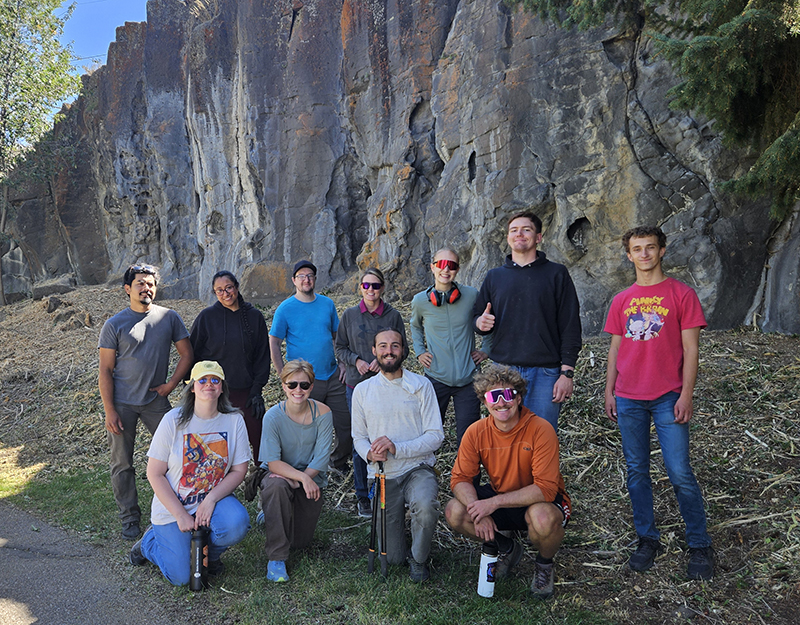 Outdoor education students at Ross Park climbing wall cleared brush during a service project.