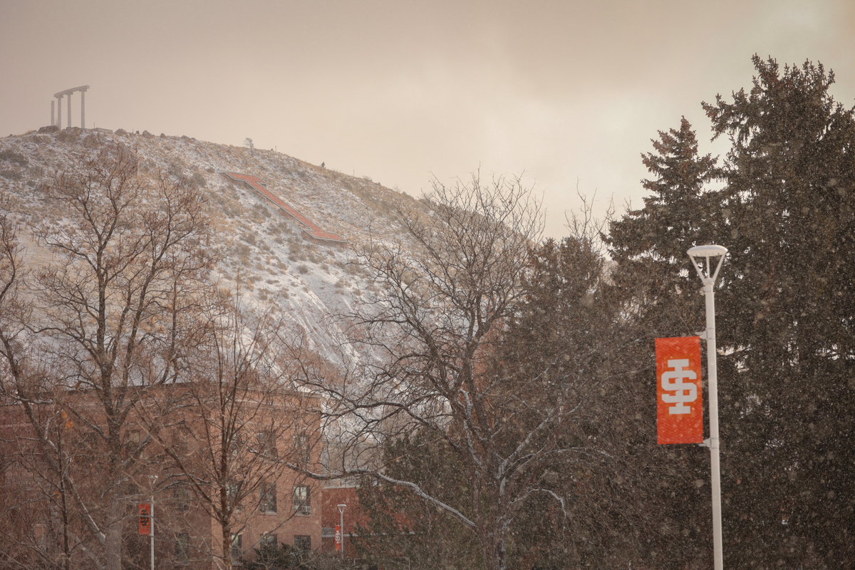 ISU pillars in winter with Red Hill I and campus views