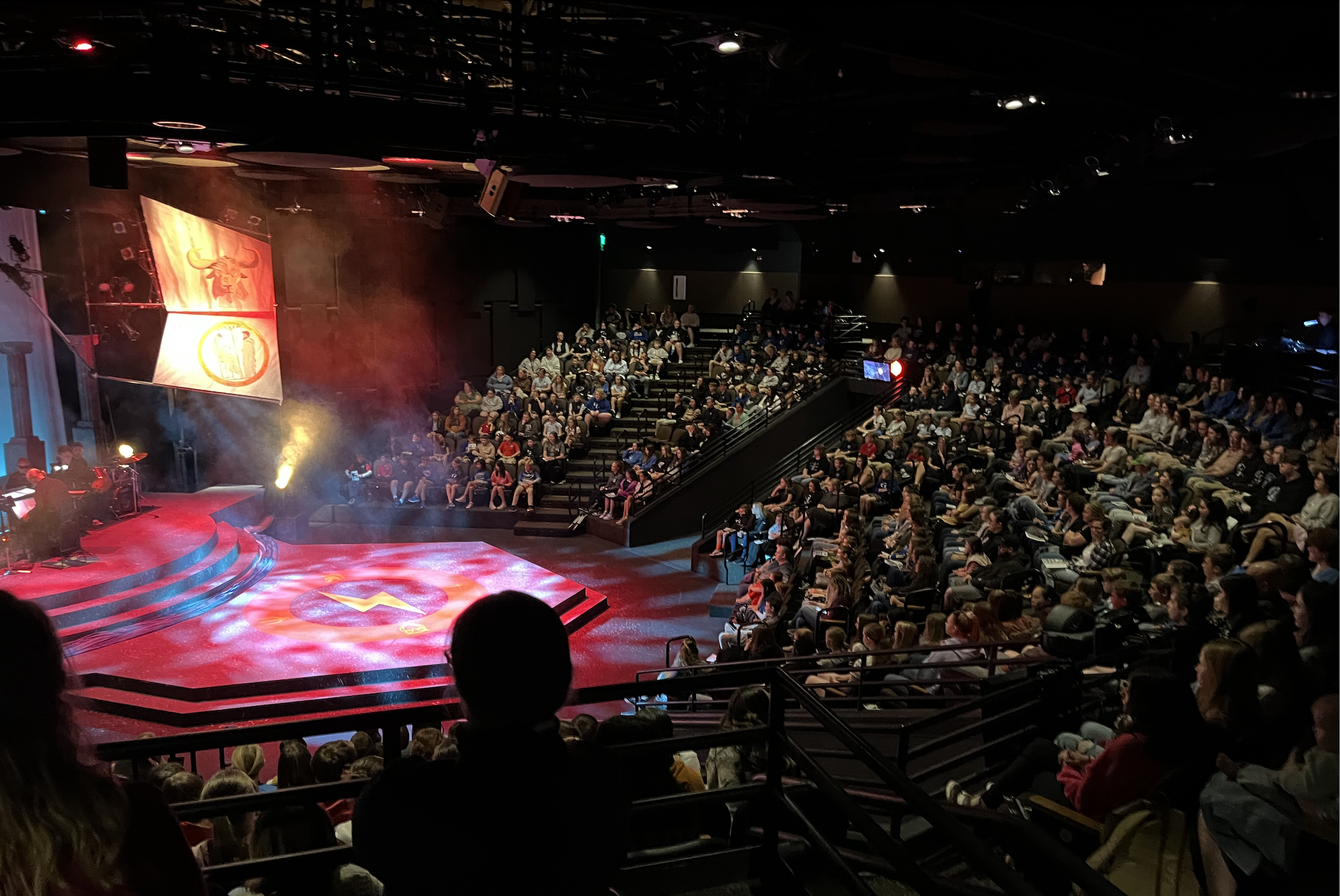 Students enjoy a matinee performance of The Lightning Thief