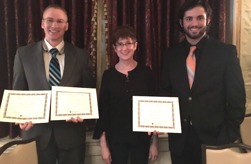 Picture of  Brycen Wendt, advisor Mary Lou Dunzik-Gregor,and Antonio Tahhan with their awards. 