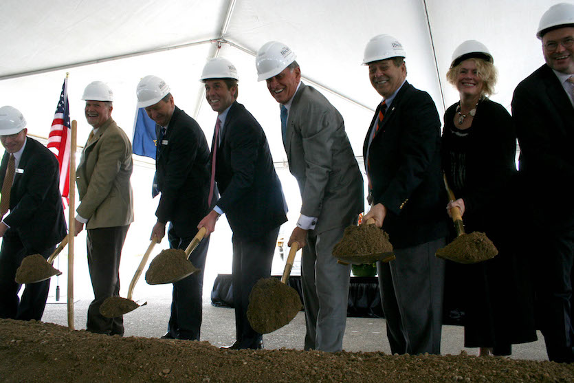 A photo of the groundbreaking ceremony with VIPs on hand with shovels. 