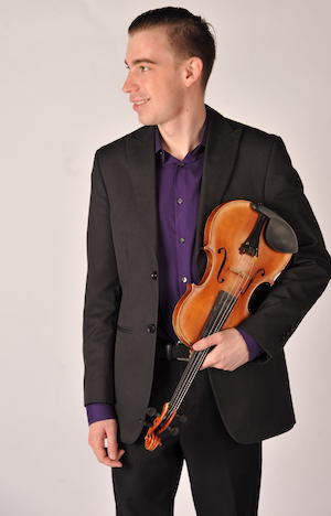 Jedd Greenhalgh posing with his violin.