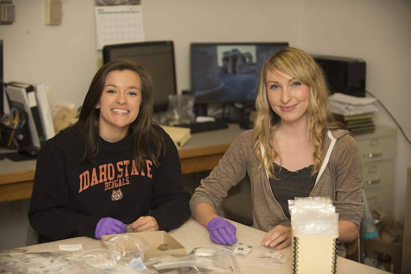 May Career Path Interns of the Month, KC Anderson, left, and Stephanie Greeson, at work in the Idaho Museum of Natural History.