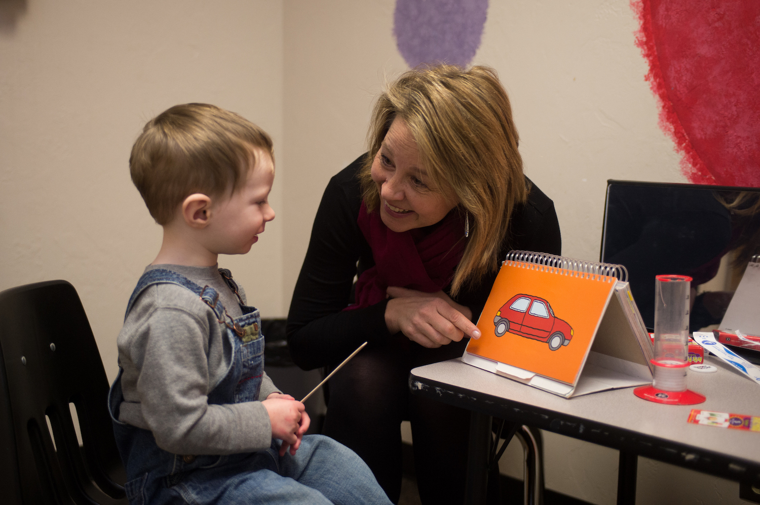 ISU speech language pathologist professor Wendy Morgan works with a child at ISU's Speech Language and Hearing Clinic in Pocatello.