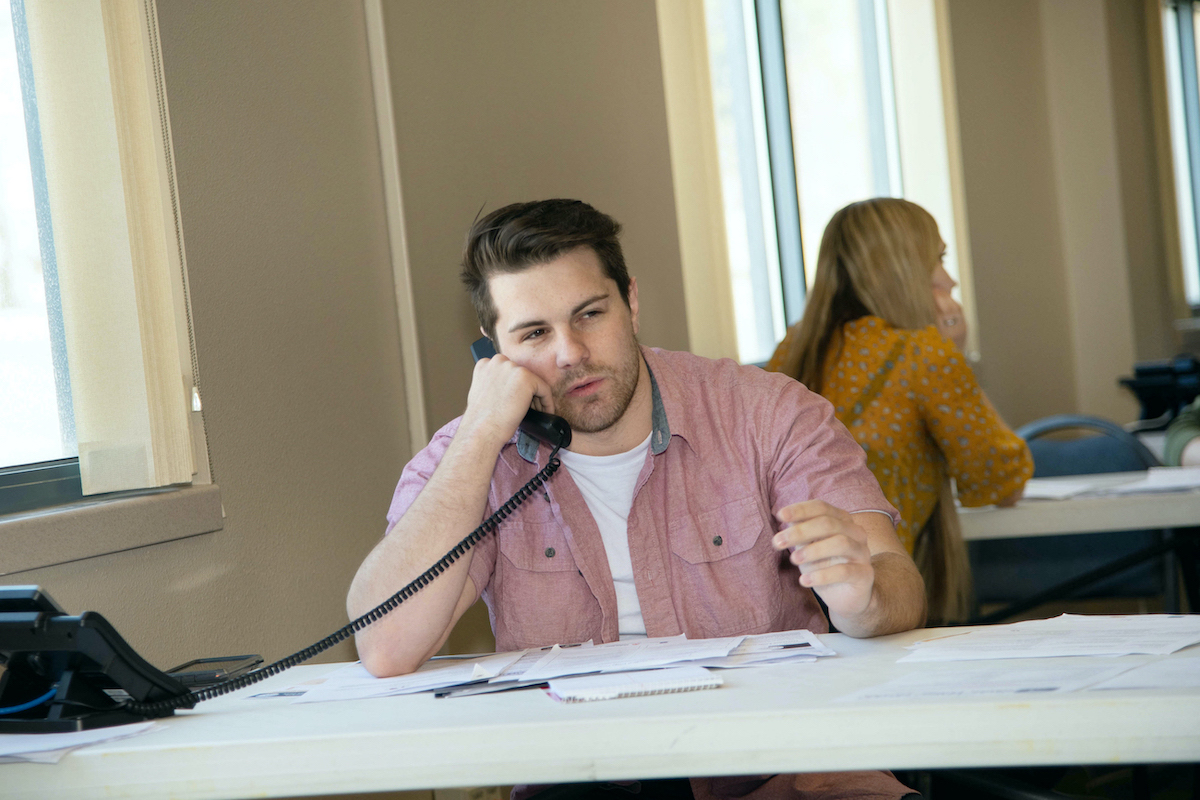 ISU nursing students answering phones at COVID-19 hotline.