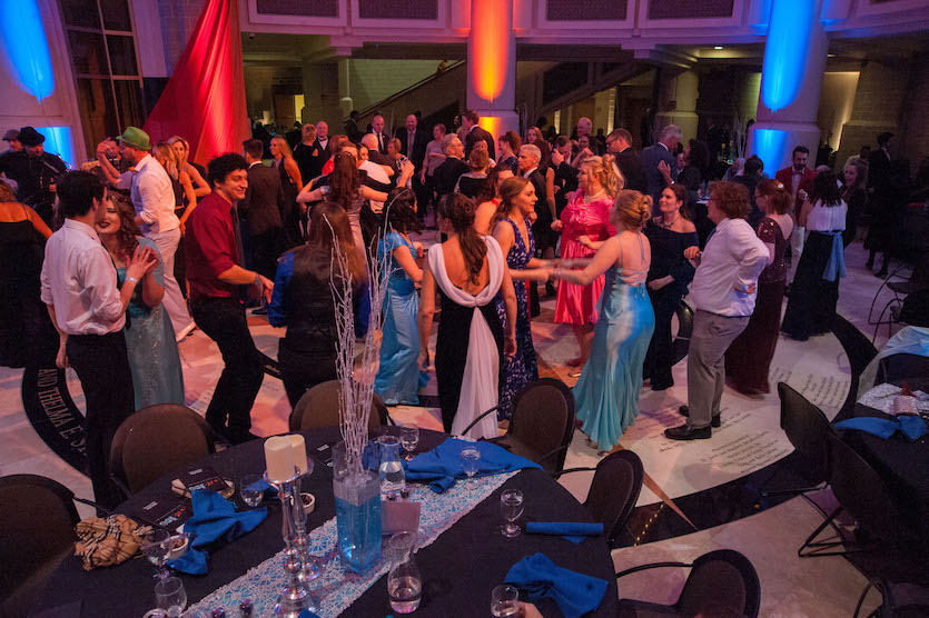 Photo of people mingling at the 2017 gala. 