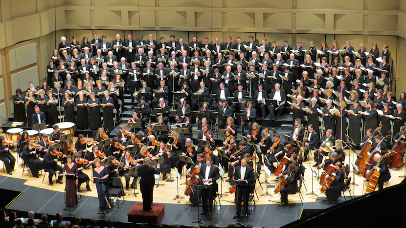 Photo of entire Idaho State Civic Symphony on stage at the Jensen Grand Concert Hall. 
