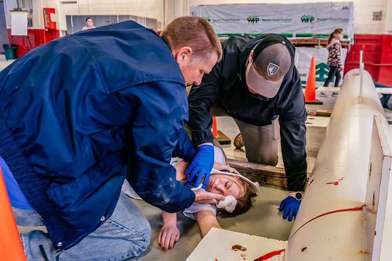 ISU theatre students act as patients in a disaster scenario as health sciences students care for their injuries.