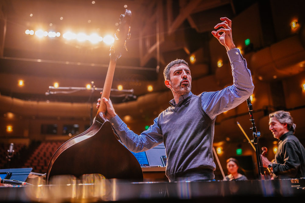 Pedro Giraudo, an Argentine composer, performs with members of the Idaho State Civic Symphony in preparation for recording an album with the Idaho State University Commercial Music program.