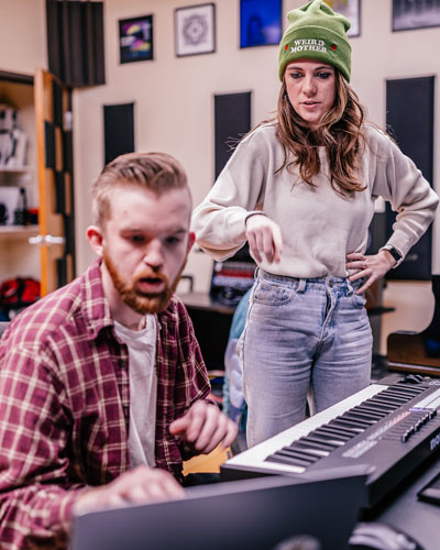 Commercial Music students work with visiting music producer, Jesse Hanson (right) in the Medina Recording Studio, in the Fine Arts building on ISU’s Pocatello campus.