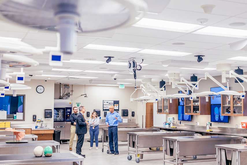 President Wagner taking a tour of the Meridian Campus healthcare labs.