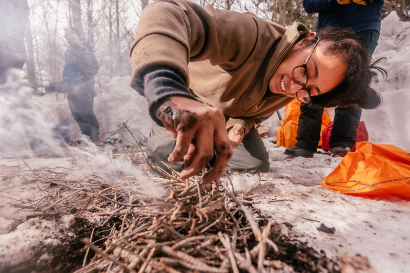 Students learn invaluable outdoor survival skills during a class outing.