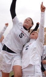  Natalie Graham and Kilee Quigley celebrate after the win Sunday.